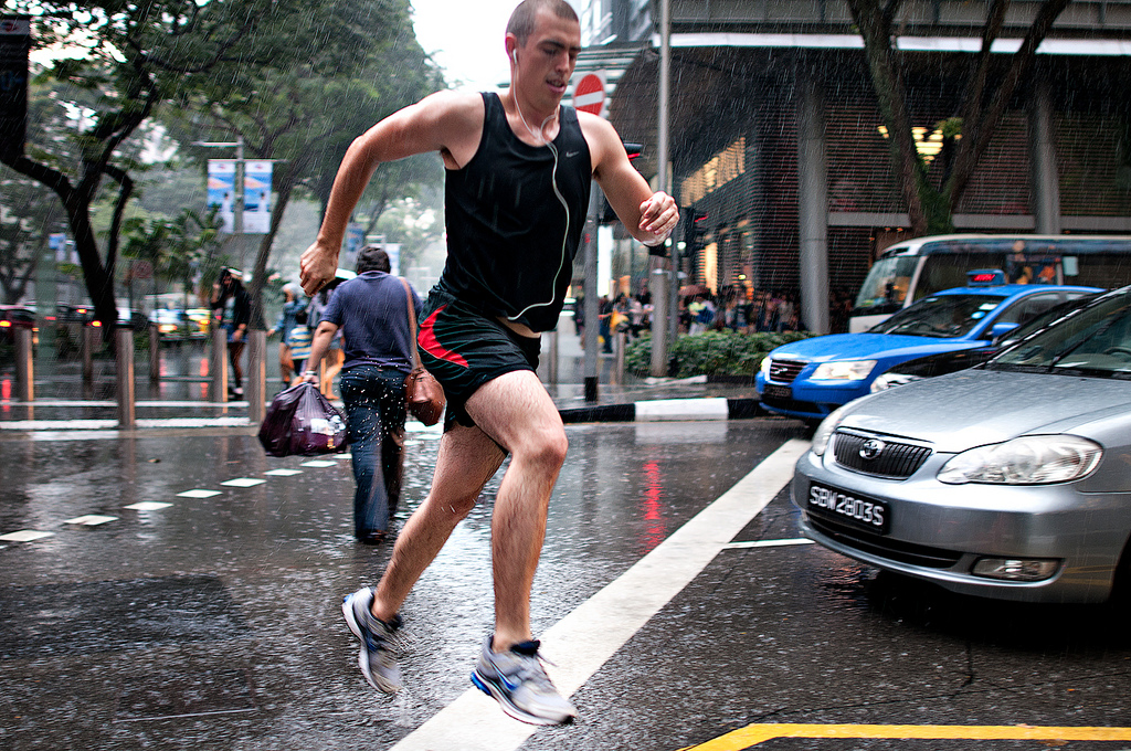 Boy Running in the Rain