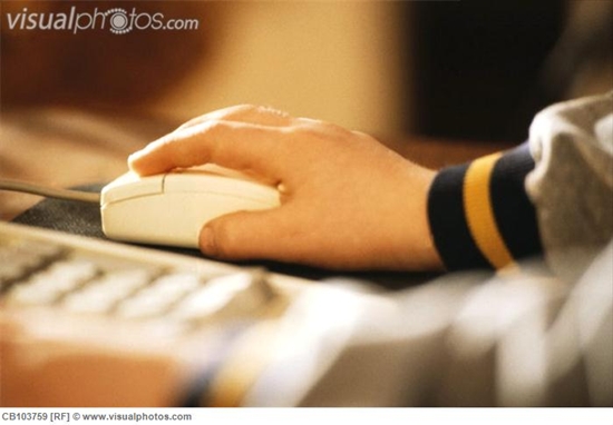 Child Using Computer Mouse