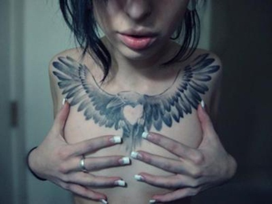 sexy-female-chest-tattoo-21364987
