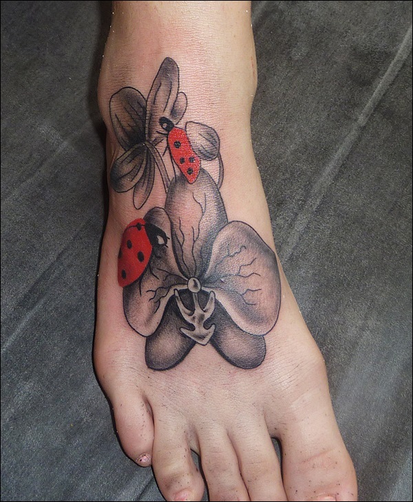 Orchid with Ladybug tattoo
