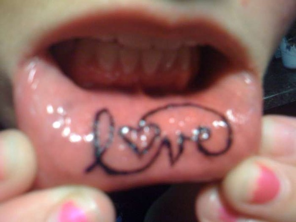Under the lip tattoo